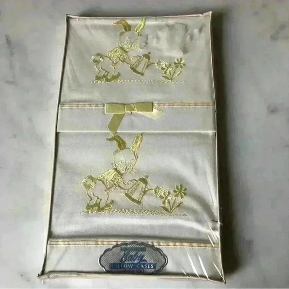 New in package! Pair of baby pillowcases with  yellow bunny gardener embroidery. - Picture 1 of 9